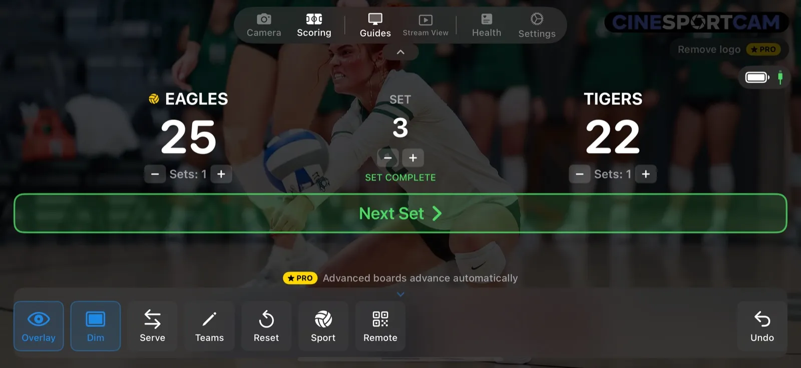 L’écran de score du volley-ball après un set gagné, avec le bouton vert Set suivant