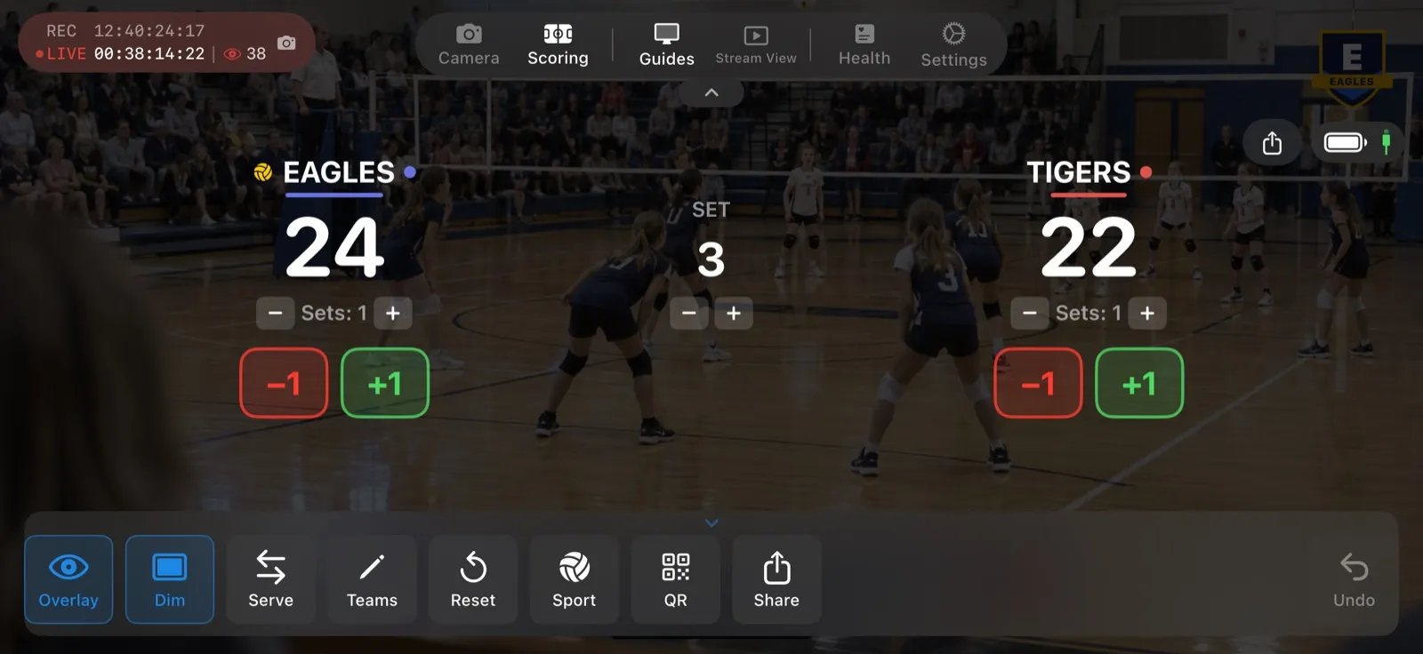 Scoring mode while live: the action bar with Share next to QR