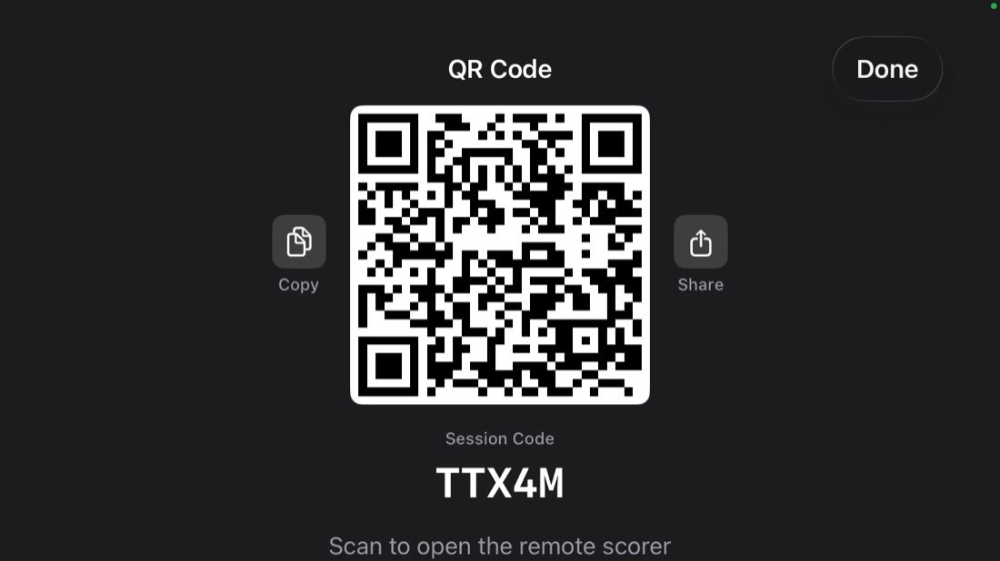 The Invite a Remote Scorer sheet with a QR code and a five-character code